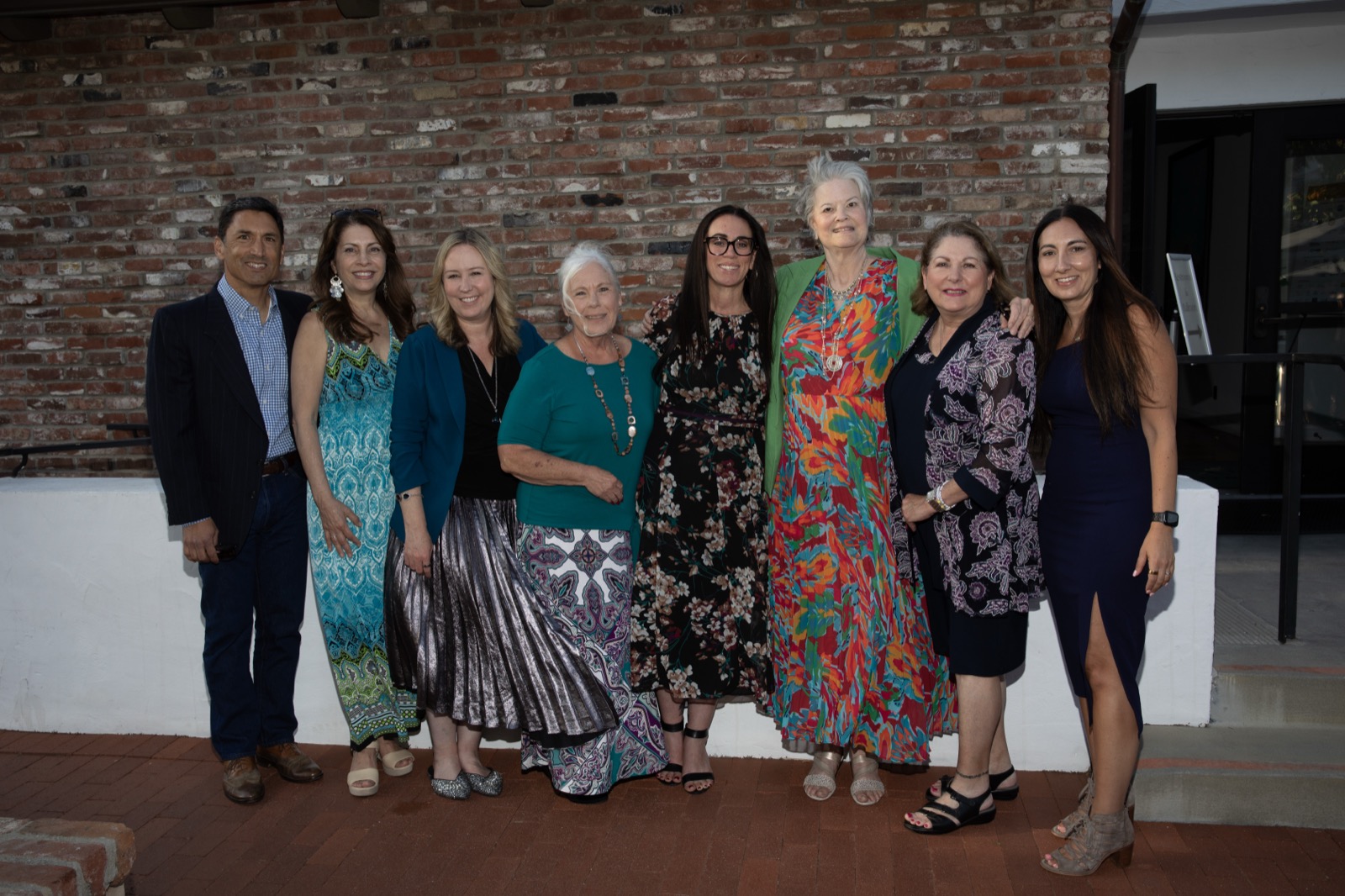 A large group photo at the reception