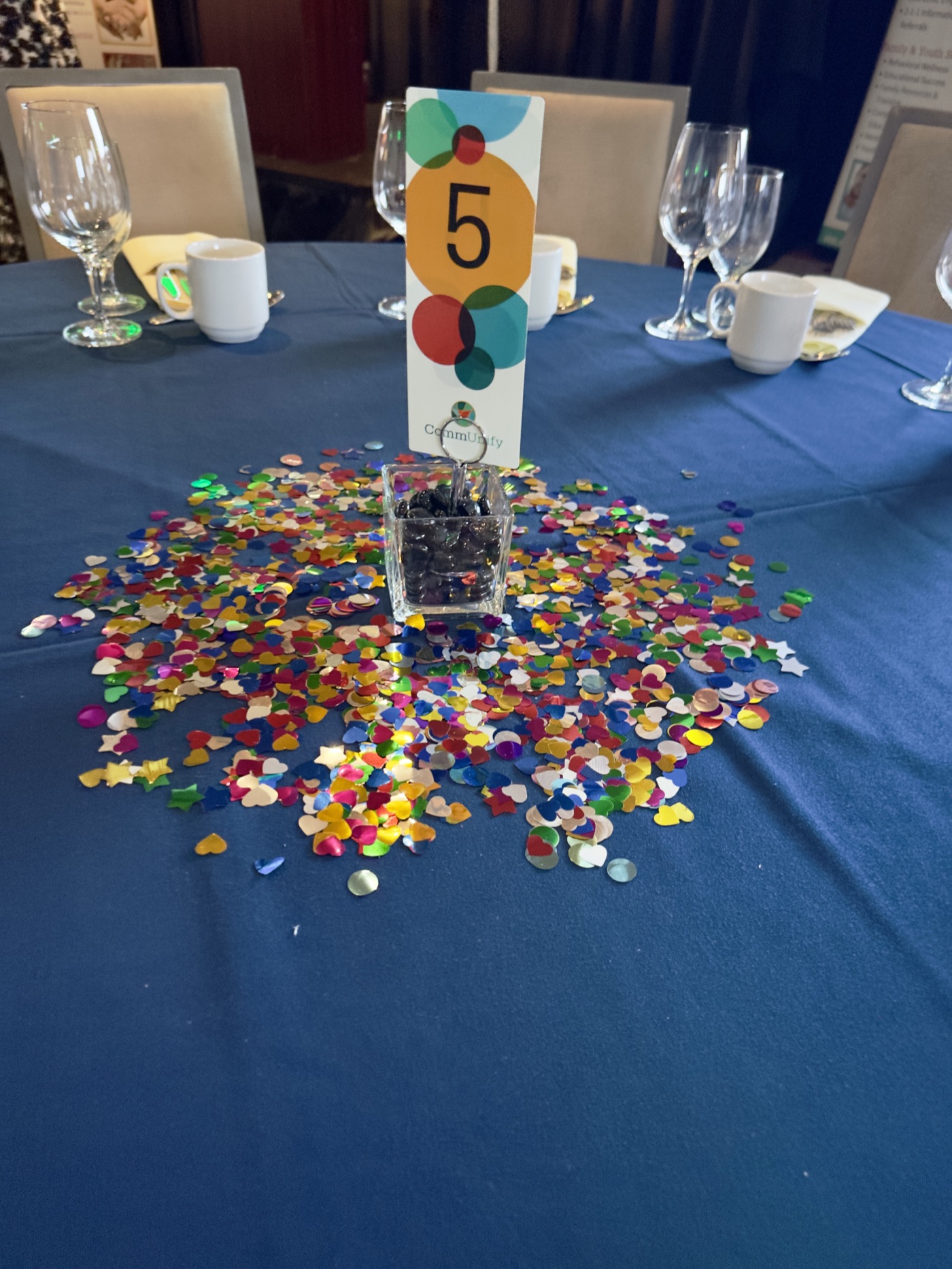 Confetti centerpiece on a dinner table