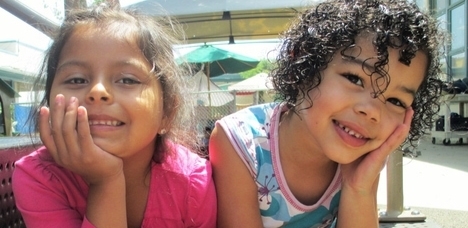 An Early Head Start caregiver with a young child